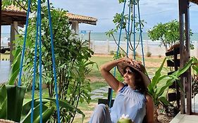 Studio pé na areia com 2 quartos, sala e cozinha